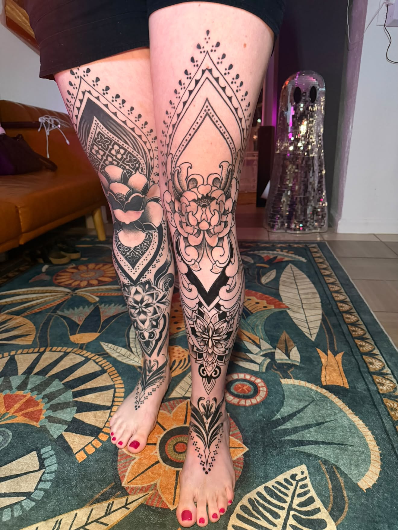 Both legs by Jenna, ornamental mandala and floral black work